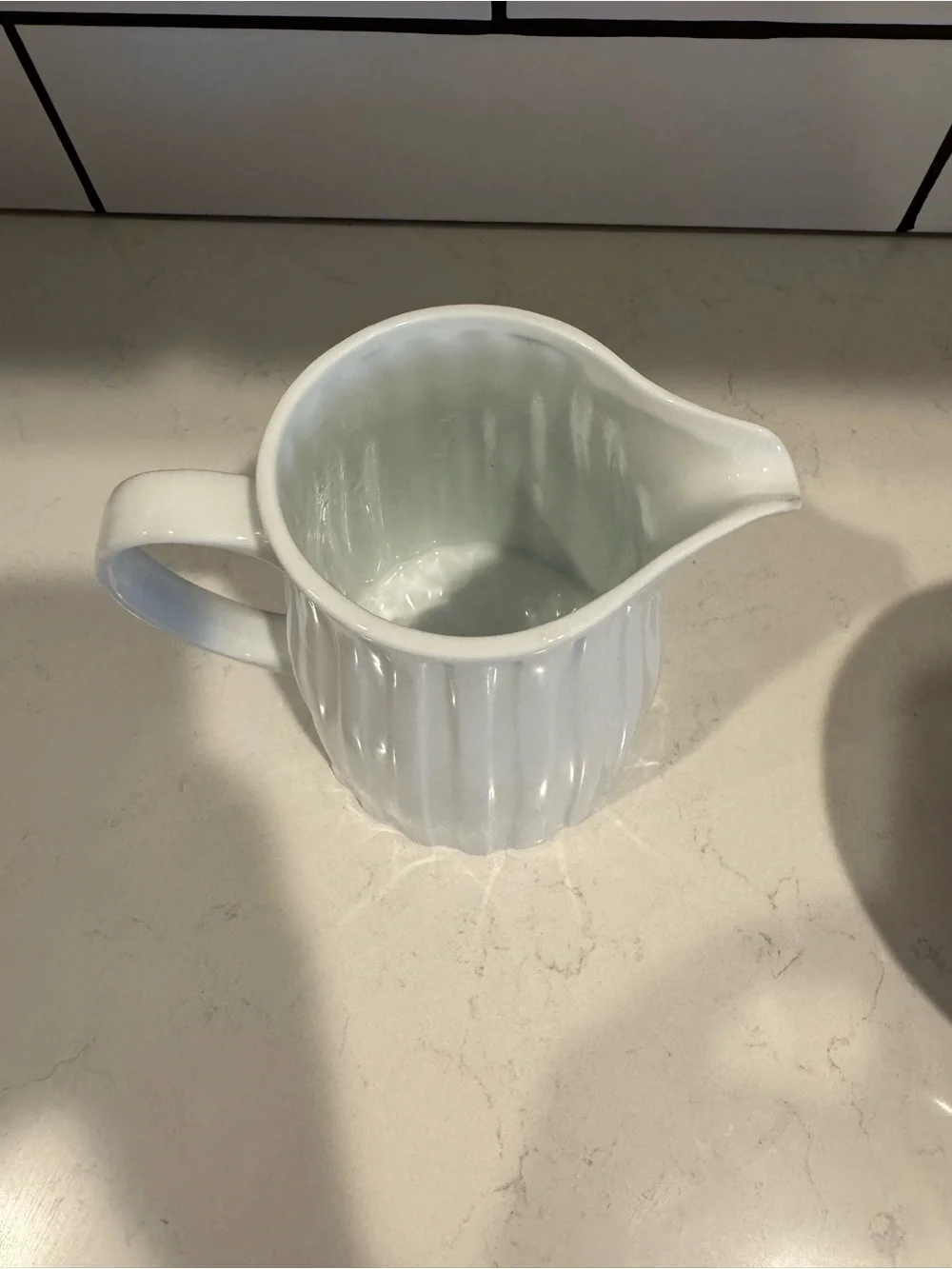 Crate&Barrel White Scalloped Ceramic pitcher